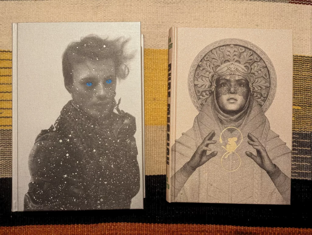 Folio Society editions of Dune and Dune Messiah side-by-side, featuring portraits of Paul Atreides with blue eyes and Lady Jessica in ornate robes.