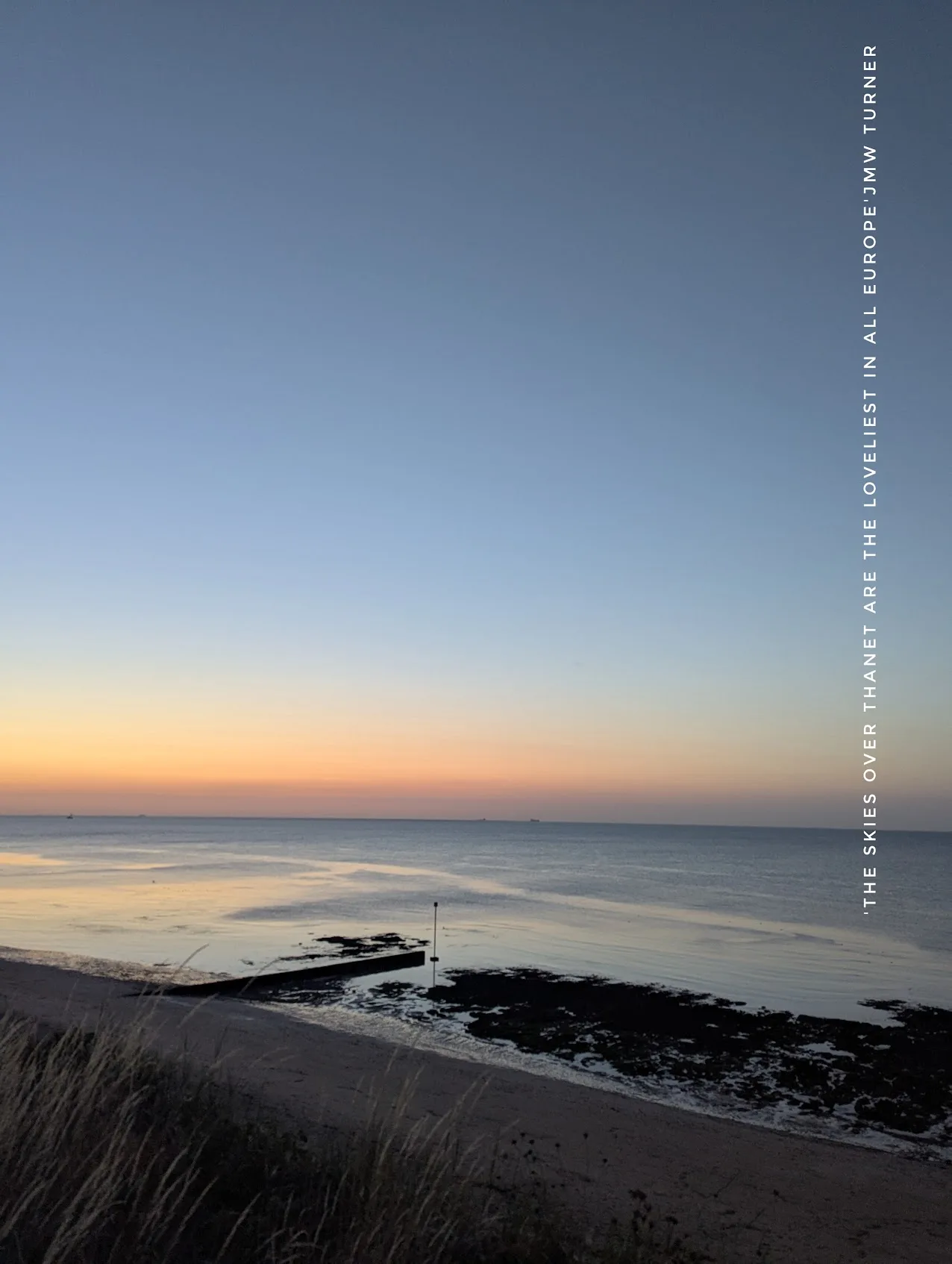 Sunset over a beach with a groyne and vertical text: 'The skies over Thanet are the loveliest in all Europe' JMW Turner.